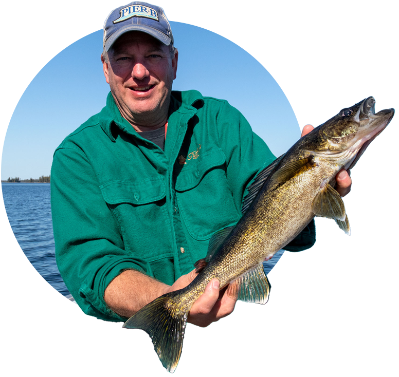 Holding a walleye